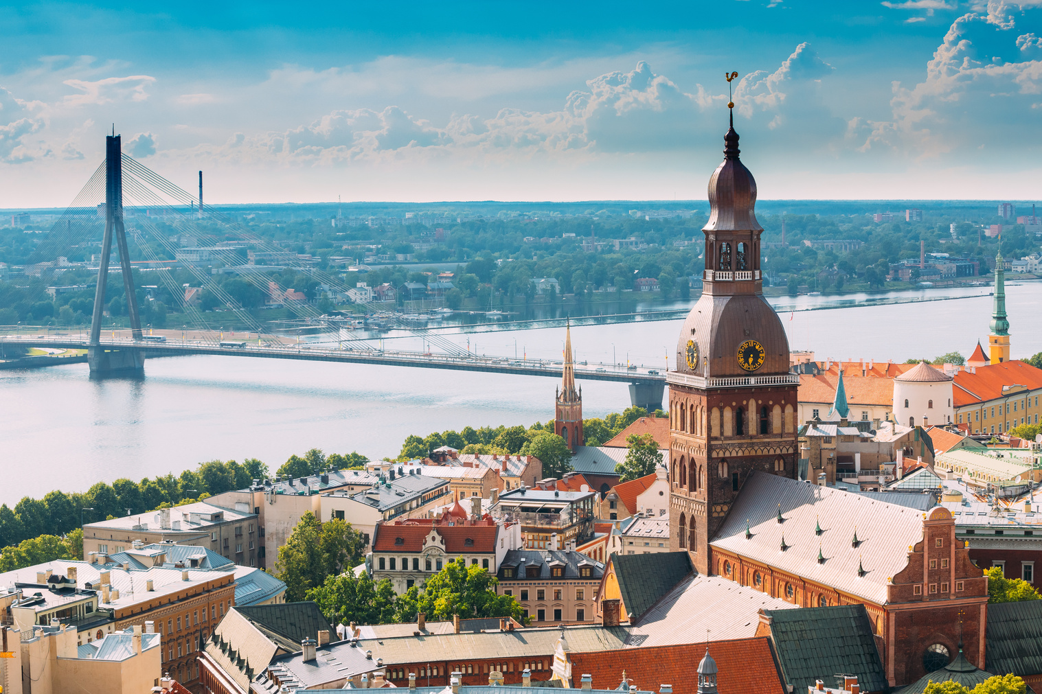 Riga, Latvia. Cityscape In Sunny Summer Day. Famous Landmark - Riga Dome Cathedral